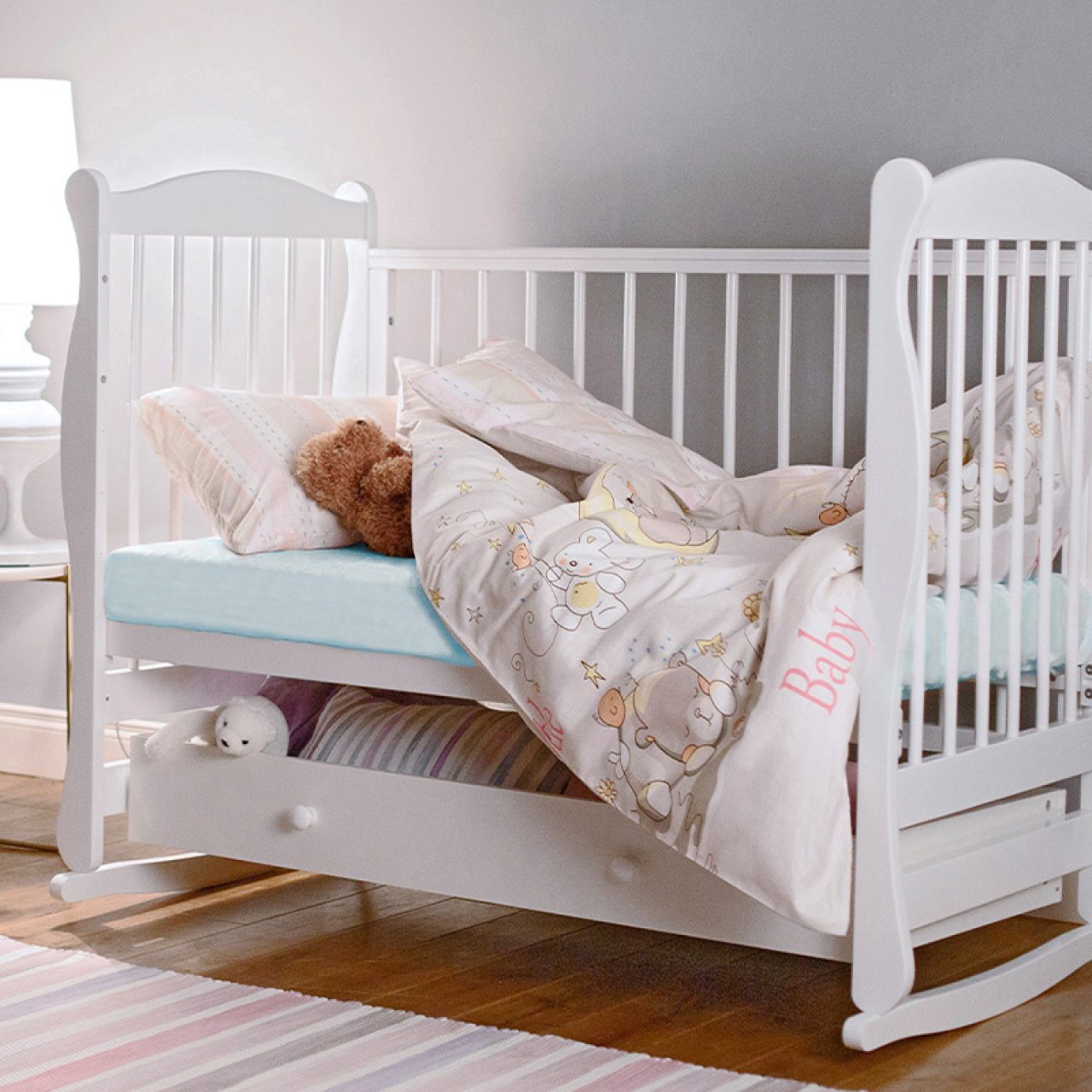 Детская простыня на резинке Трикотажная голубая