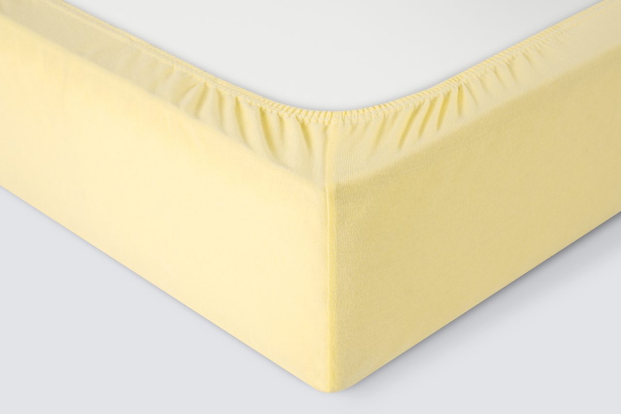 Простыня на резинке Трикотажная нежно-желтая